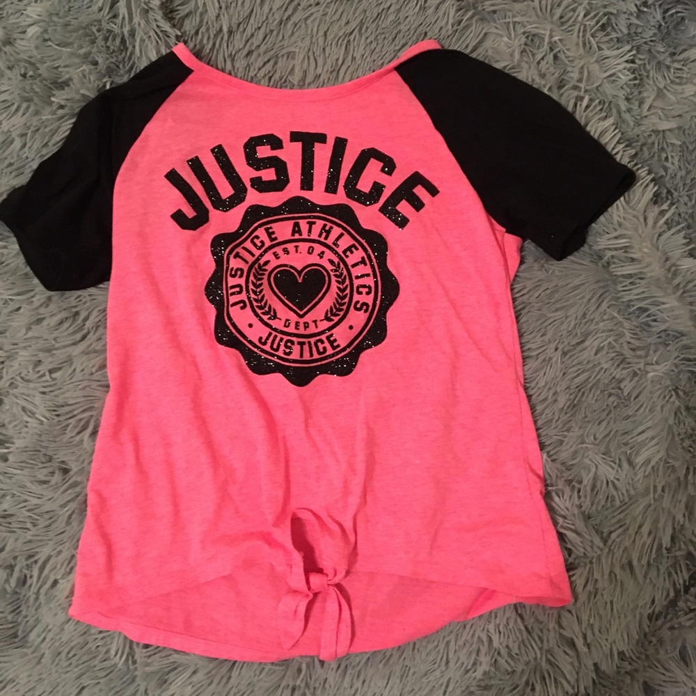 Black and pink shirt with Justice logo